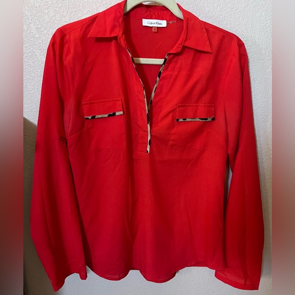 Calvin Klein Tops - Women’s Calvin Klein Button Up Long Sleeve
Sz XS Red w/ Animal print Edging NWOT